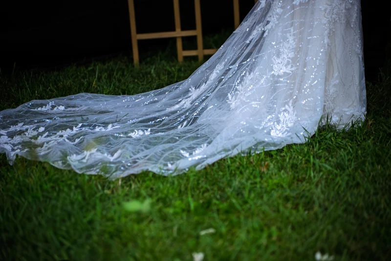 The embroidered train of Kelly’s wedding dress